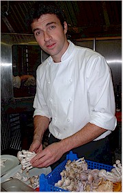 Chef Martin Wishart, preparing the wild mushrooms for the chicken main course