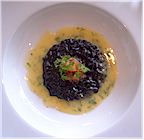 Risotto of squid ink with chervil butter sauce